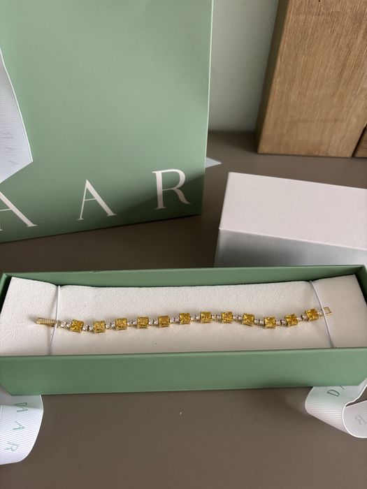 Bratara tennis DAAR din argint galben.Certificat de garantie