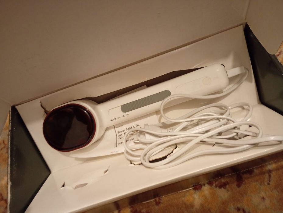 Vând un aparat de Masaj cu infla roșu că și nou model BEURER MG 20