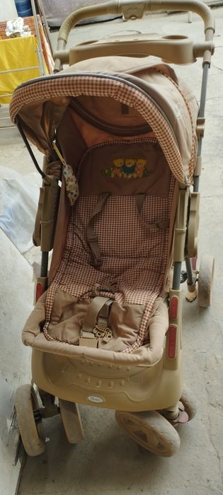 Детская коляска с перекидной ручкой