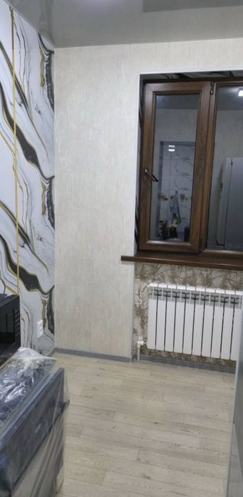 Срочно! Квартира на Яшнабад-Магнит 2/4/4 общ пл 53м ,балкон 2*6