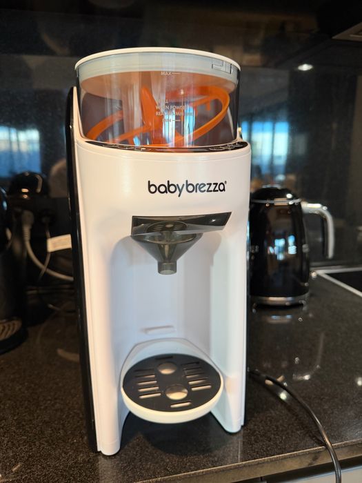 Babybrezza уред за мляко