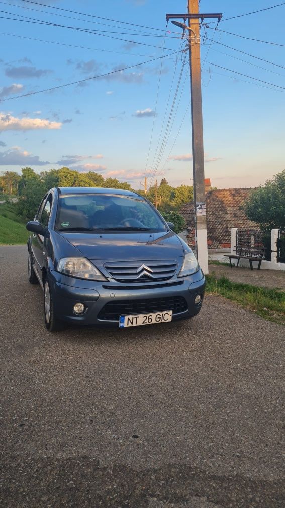 Citroen C3 model exclusive an 2009 1.4 diesel  comenzi volan consum mi