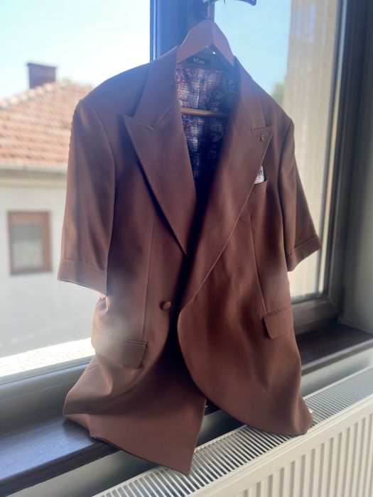 Костюм за поводи