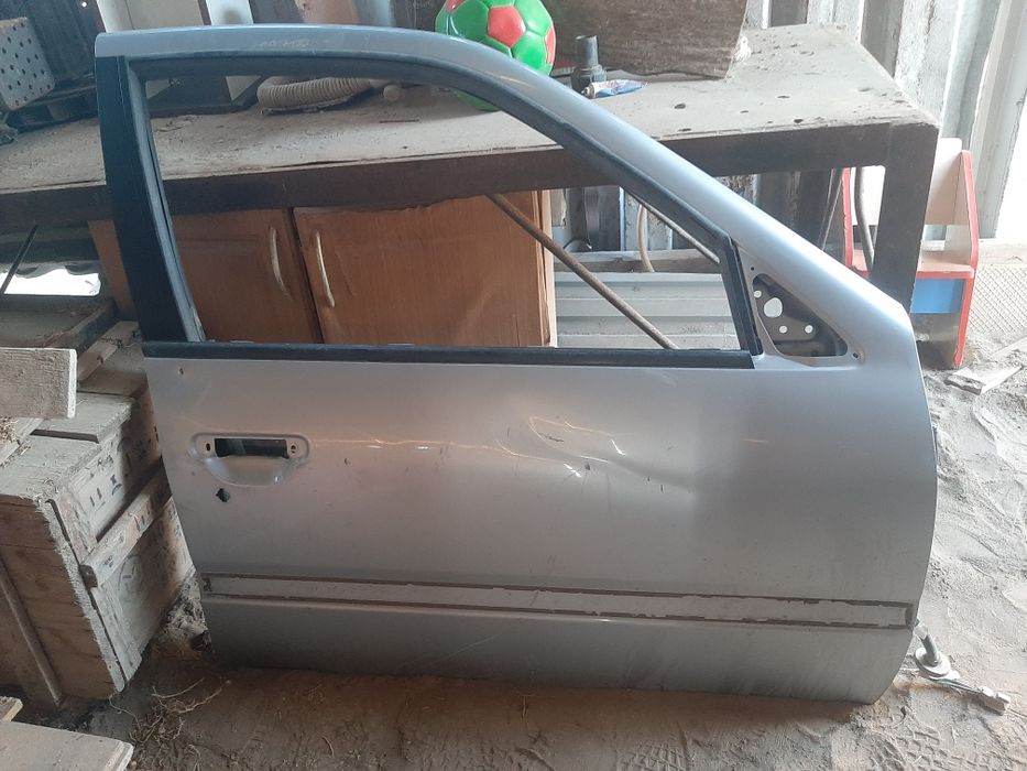 Передняя дверь Примера