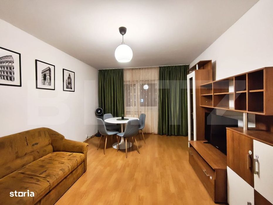 Apartament spatios cu 3 camere, 74 mp, 2 bai si balcon inchis, zona Io