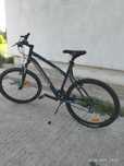 Bicicleta aproape noua