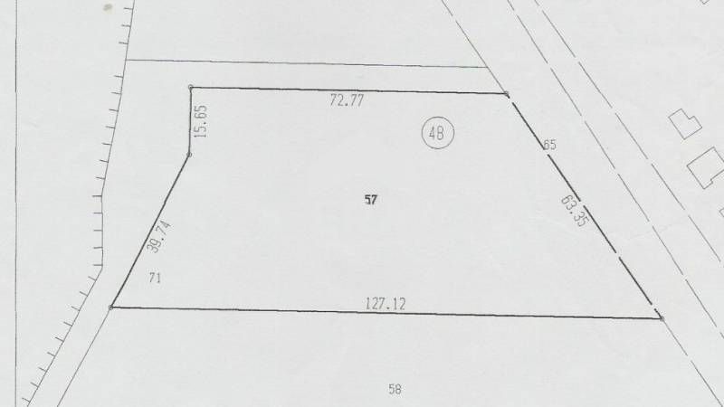 Regulated plot with building permit for complex of houses near the sea