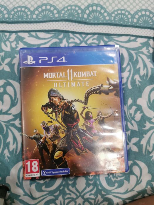 Продам мортал комбат 11 описание!!
