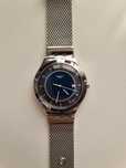 Часовник Swatch blue icone