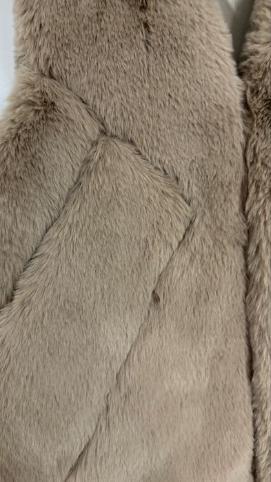 Vesta din blanita artificiala