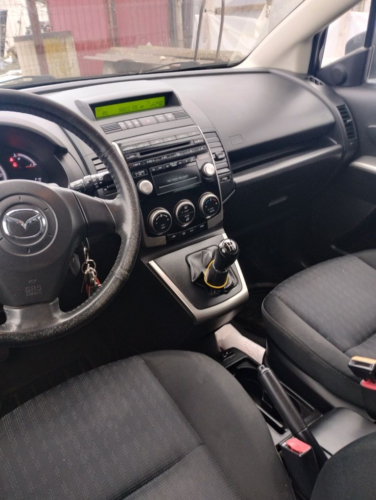 Vând Mazda 5,7 locuri,2010 luna10,1,8 benzina