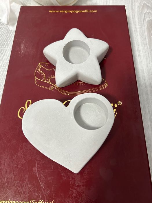 Vând suport pentru lumânări.