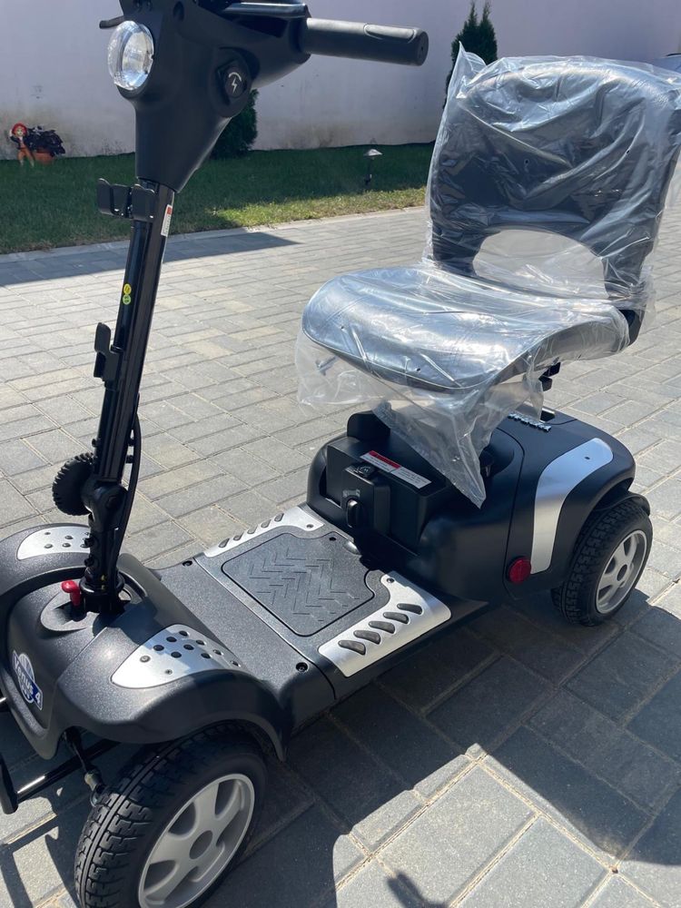 Vand scooter electric nou, pentru persoane cu dizabilitati.