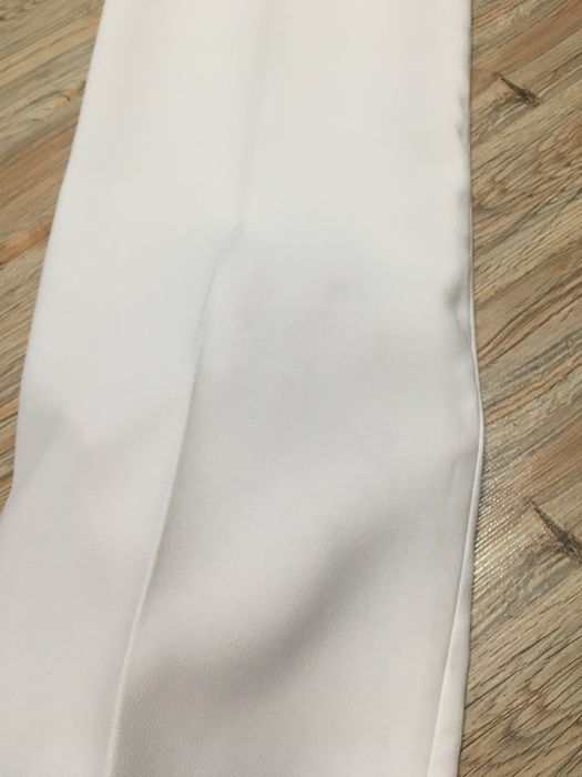 Pantaloni albi cu croi drept Zara