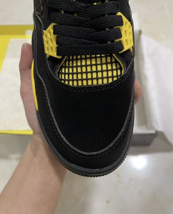 Air Jordan 4 Retro Thunder