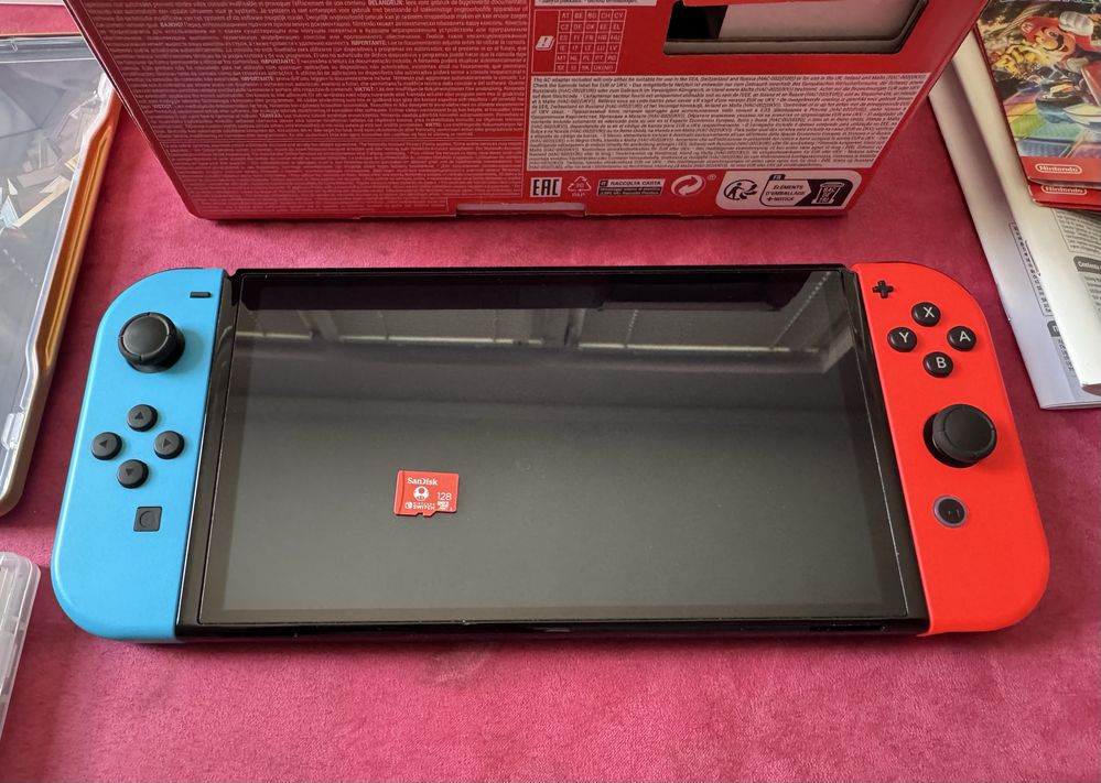 Nintendo Switch Oled - пълен комплекс + 3 игри и 128гб. карта