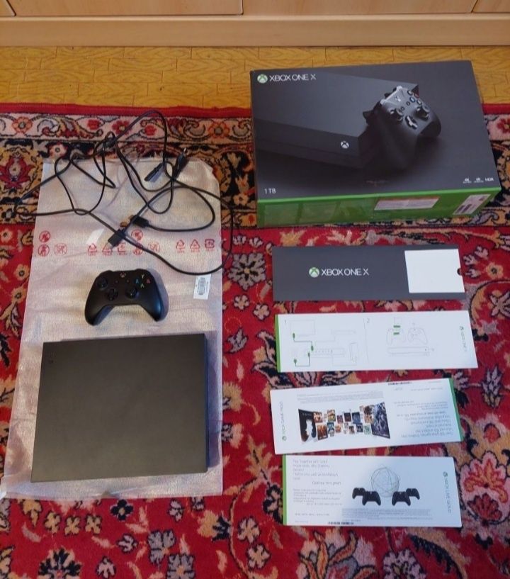Xbox one X  ultra 4k ,..1T,port incarcare myria 2 baterii+7 jocuri .