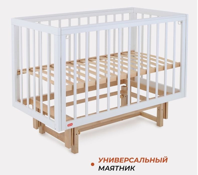 Продам детскую кроватку-манеж с продольным маятниковым механизмом.