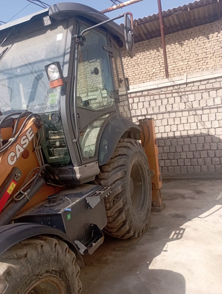 Экскаватор погрузчик сотилади CASE 570