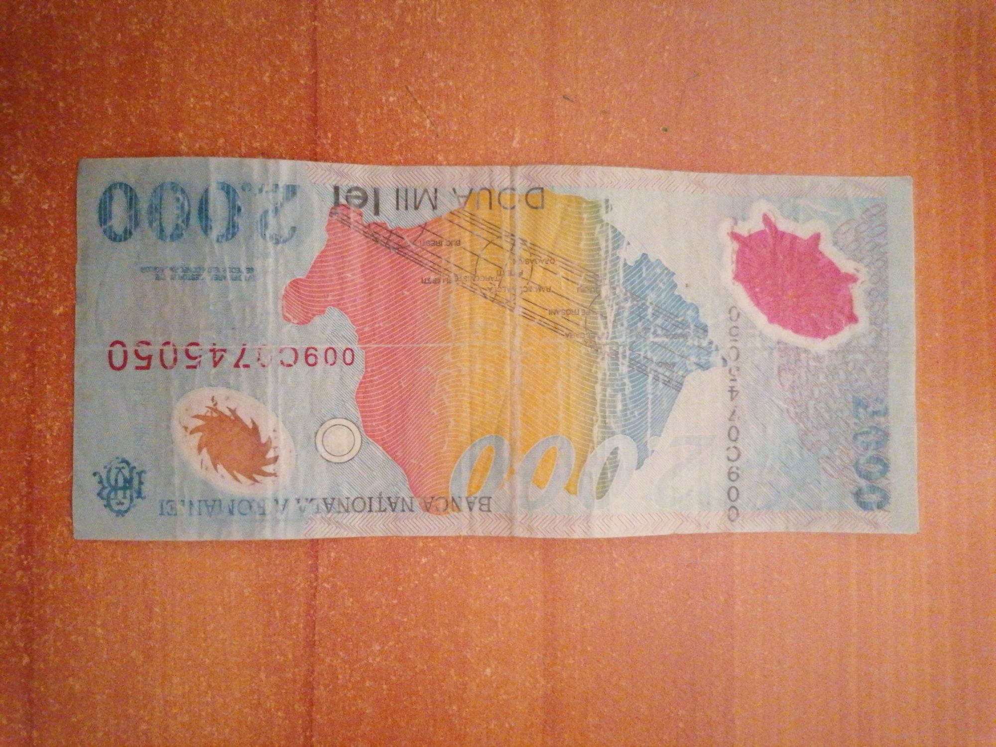 Bancnote vechi de 1000lei și 2000 lei cu eclipsa
