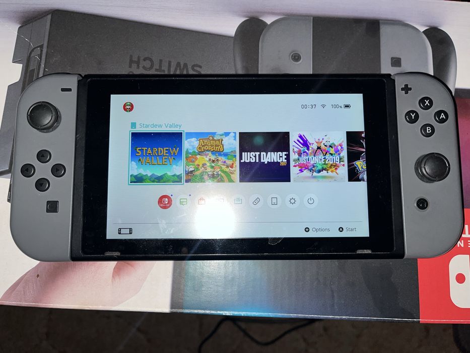 Nintendo Switch + accesorii si 5 jocuri (Animal Crossing, Just dance)