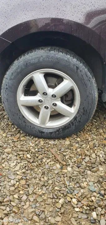 Dezmembrez Hyundai Santa Fe motor 2.2 crdi an 2007 tip d4eb 150 cp jante aliaj roti R17 jug motor lonjeron aripa spate stanga drepta calculator motor ecu modul confort can galerie admisie catalizator rola fulie vibrochen scut motor dezmembrari piese auto