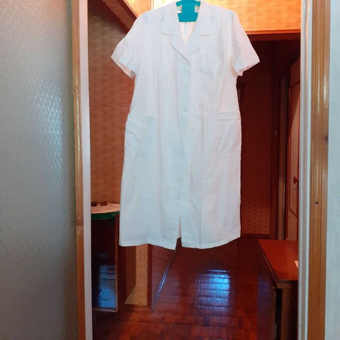 Медицинский  халат  .