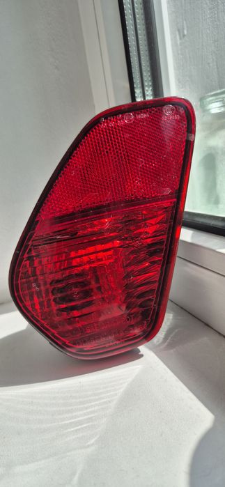 Продам Фонарь задний в бампер левый Mitsubishi Outlander