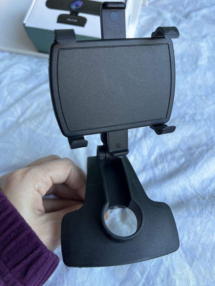 Bluetooth слушалка и стойла за кола