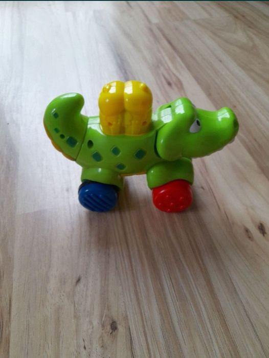 joc Jucarie bebelusi Fisher Price Crocodil apasa merge

crocodil cu ro