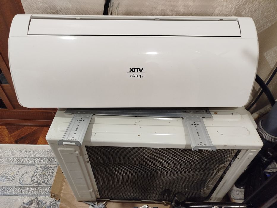 Кондиционер Аux 12 inverter б/у жудаям яхши холатда