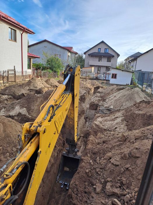 Buldoexcavator de inchiriat Basculanta 10 T  de inchiriat