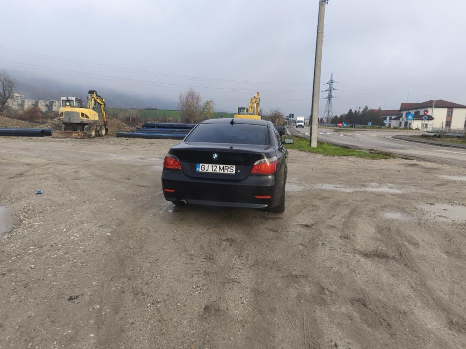 vând BMW E60 volan pe dreapta