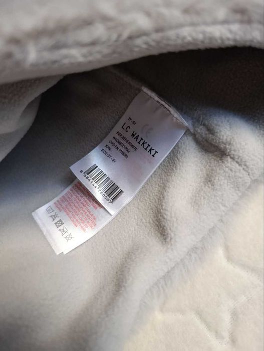 Новая шапка фирменная на флисе