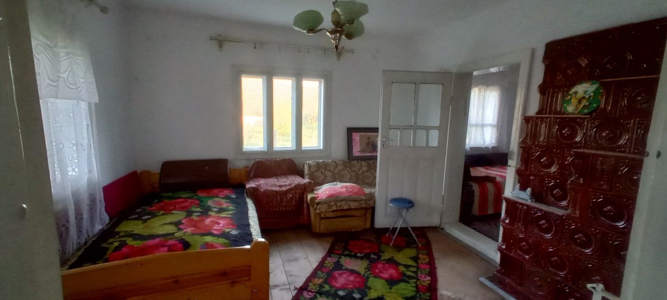 Teren in Malini cu casa bătrânească