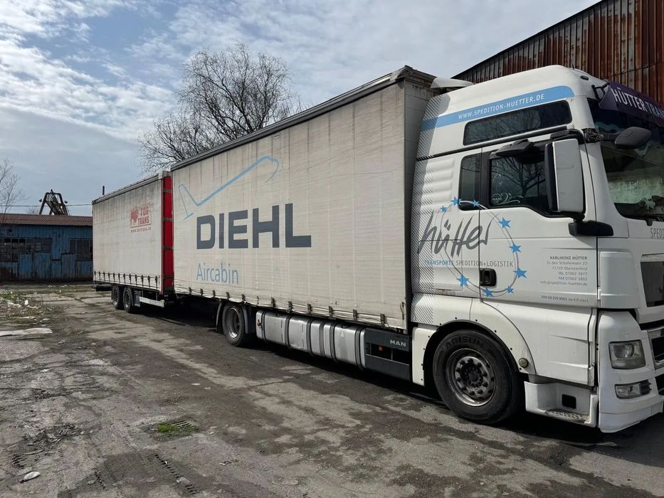 MAN TGX 18.400 E5 ansamblu camion remorca tandem mega 120m3/automat/remorca mega
