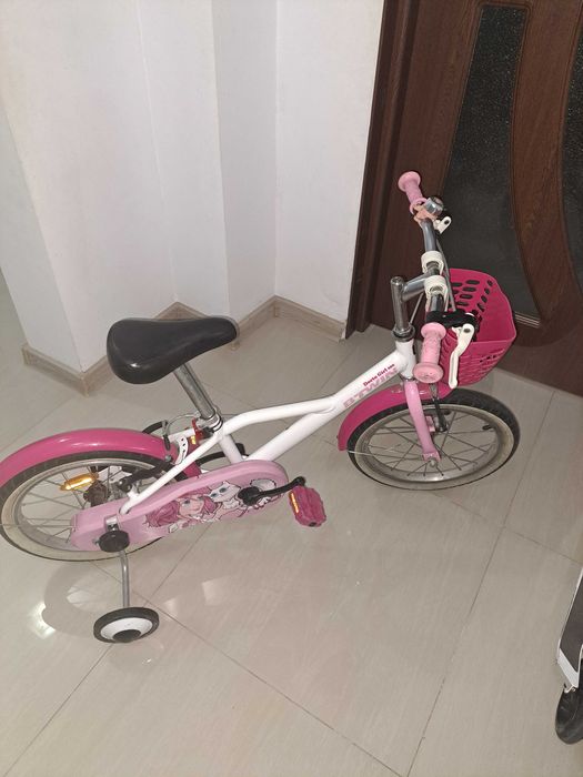 Bicicleta BTwin roz  pentru copii 4 - 8  ani