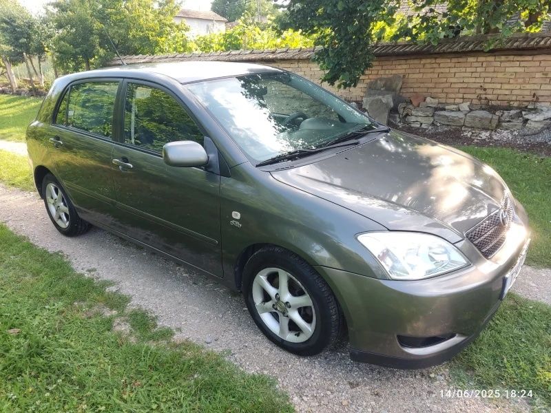 Тойота Corolla 2003