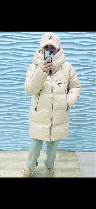 Куртки пуховики.