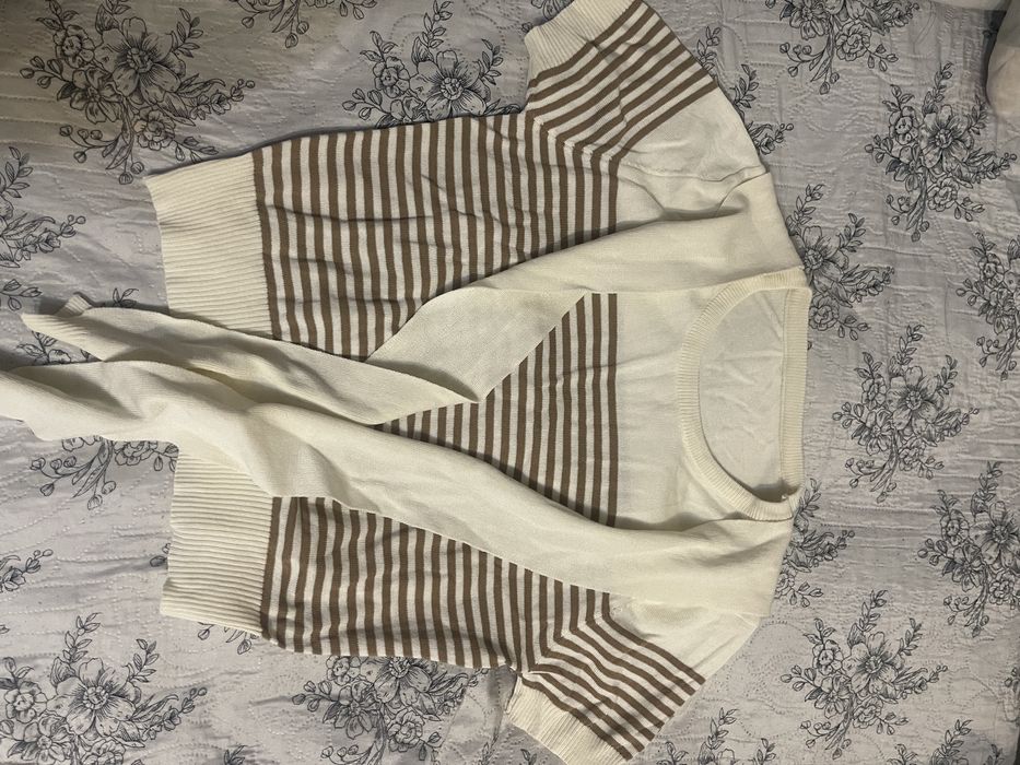 одежды по 1000 тг