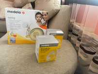 Помпа за кърма medela