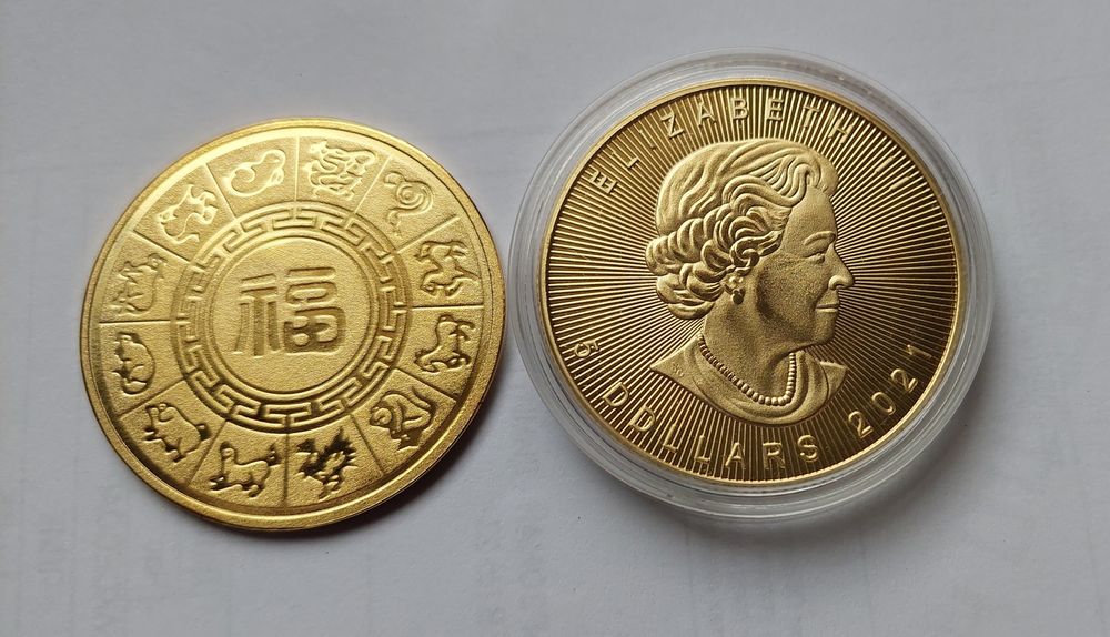 Две монети за 25 лв.