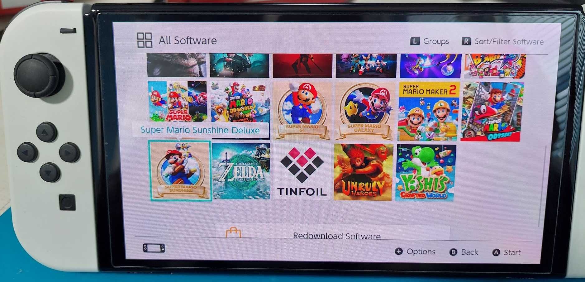 Конзола Nintendo Switch OLED, 512 gb sd card инсталирани над 40 игри
