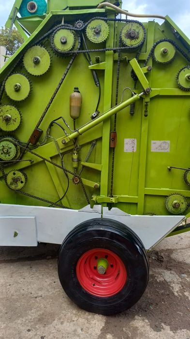 Claas Rollant 62 S.Balotiera rotunda. Recent adusa din Germania