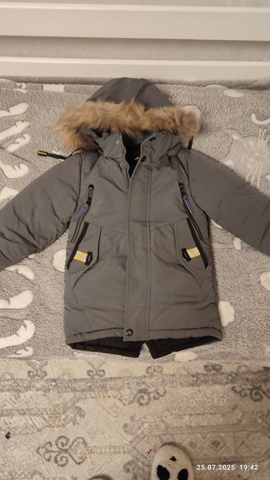 Продам,зимний пуховик ,на 5,6 лет б/у в отличном состояние , очень теп