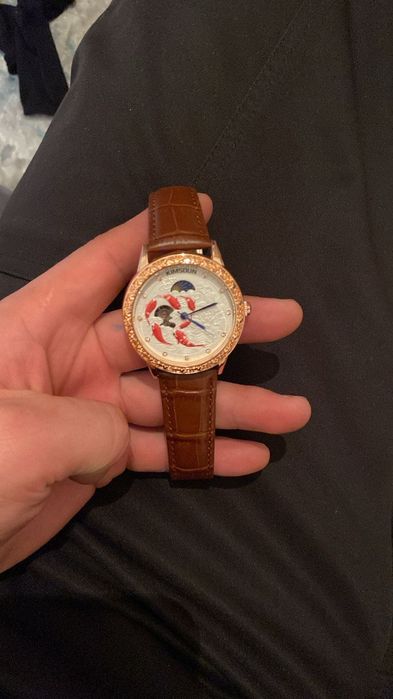 Часы  механический