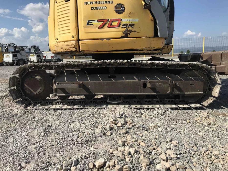 Багер New Holland Kobelco E70SR-1ES 8000кг