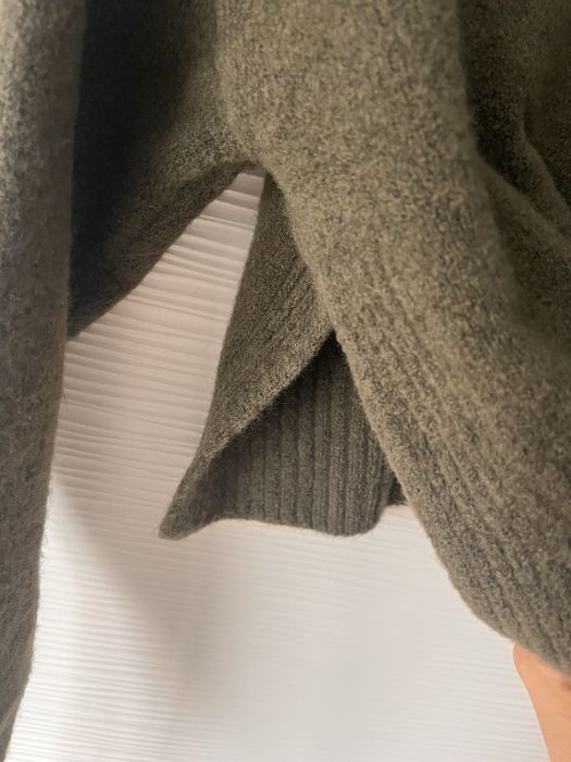 Жилетка къса с плохи встрани.