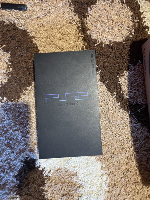 Vand consola ps 2 cu mai multe jocuri