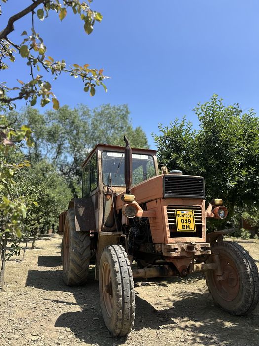 Vand tractor cu plug si disc in stare foarte buna